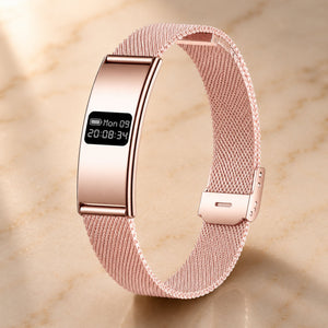 Slunix Sleep Band rose gold stainless steel mesh strap, premium product photography on cream marble surface