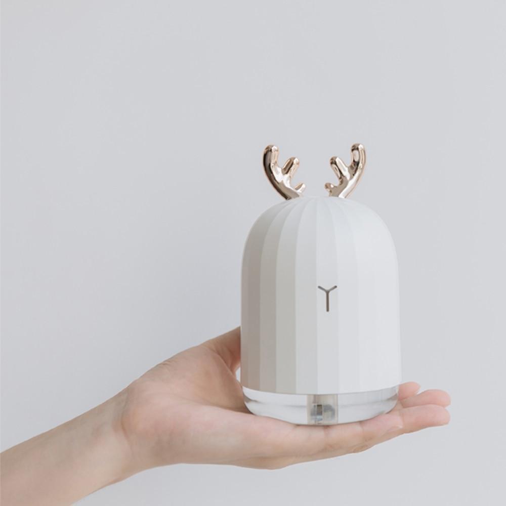 Ultrasonic Air Humidifier and Oil Diffuser compact design on bedside table
