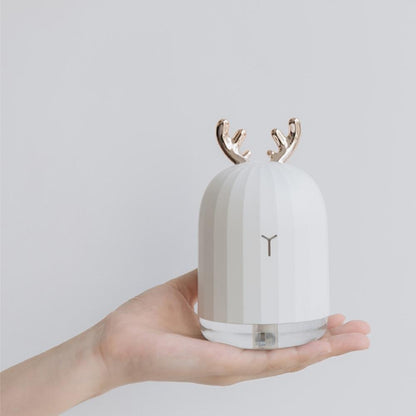 Ultrasonic Air Humidifier and Oil Diffuser compact design on bedside table